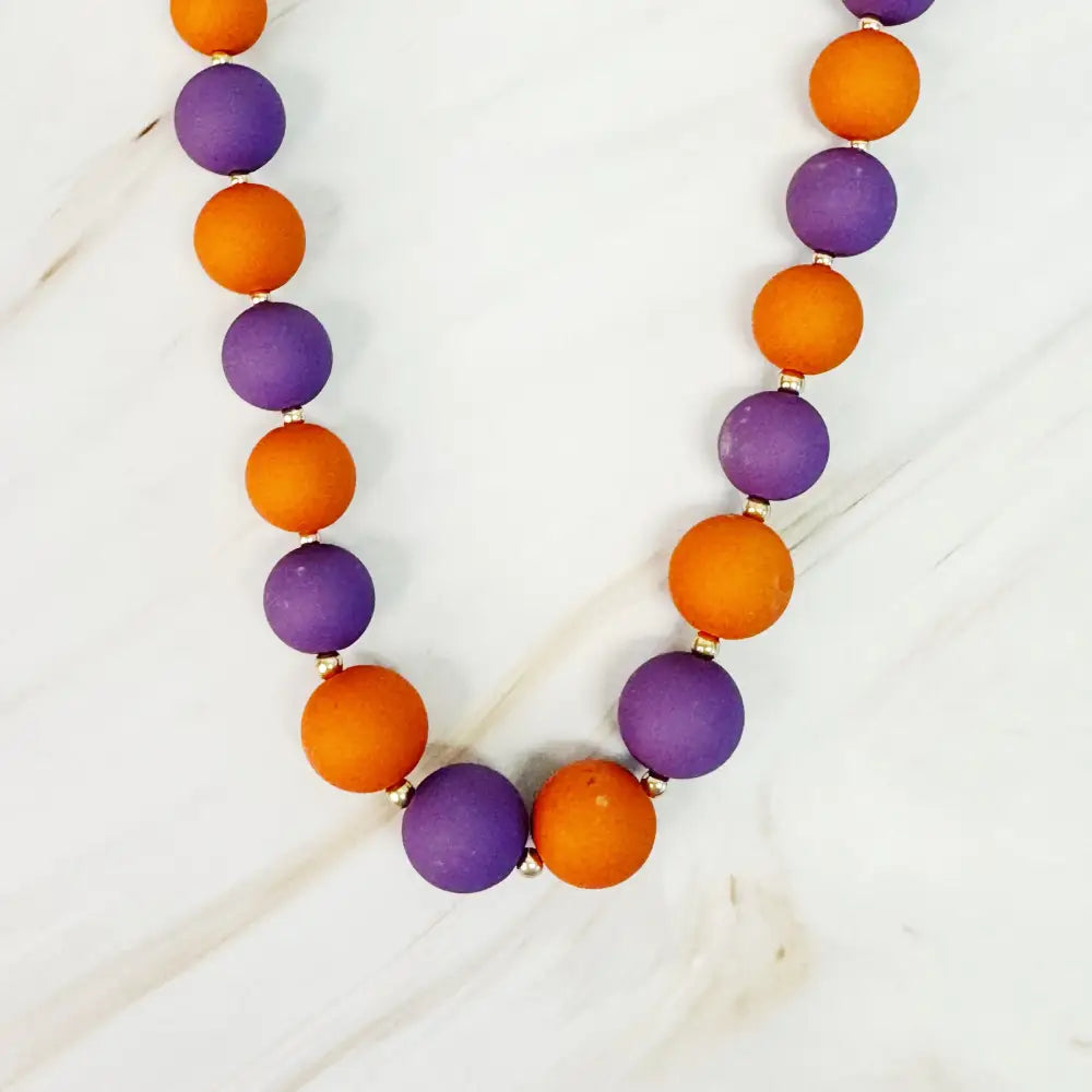 Champion Of The Game Ball Bead Necklace - Orange/Purple