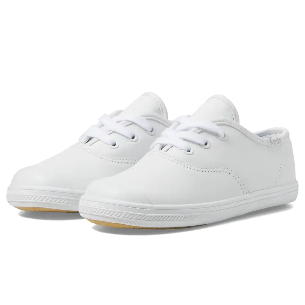 Keds Girls Champion Toe Cap (Little Kid/Toddler) Sneaker White 5 Wide - White Leather / 5 Wide Little Kid